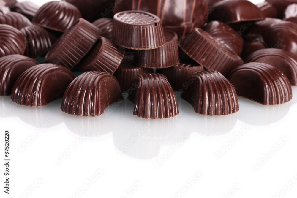 Many different chocolate candy isolated on white