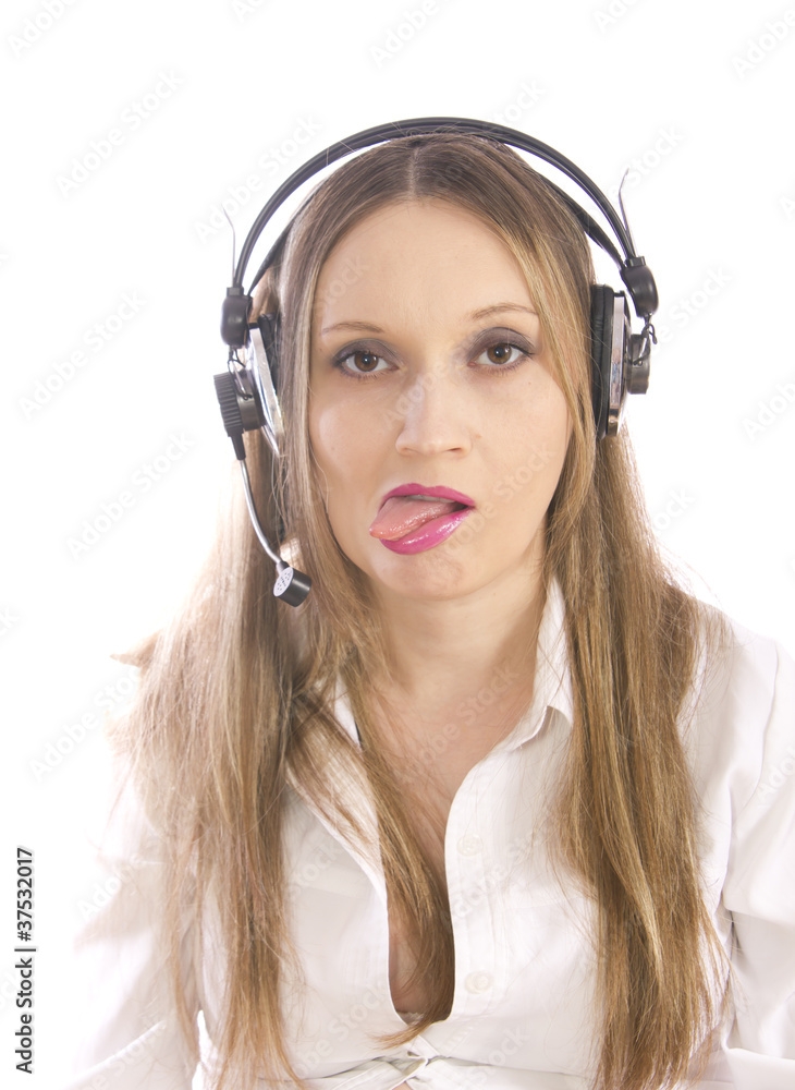 blond girl with headphones shows off her own tongue blond girl with headphones shows off her own tongue