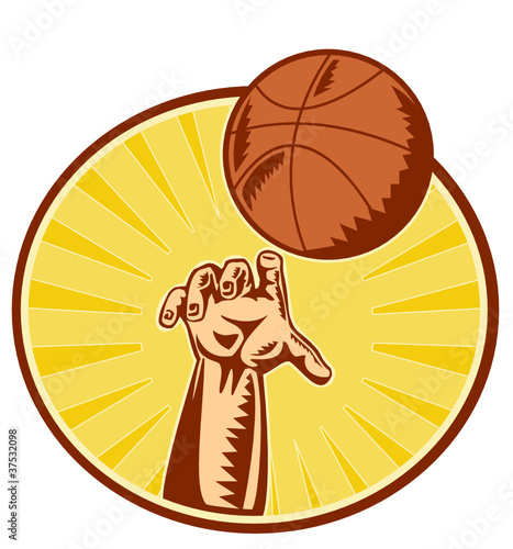 Basketball player hand catching ball