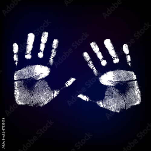 hand prints on dark background.