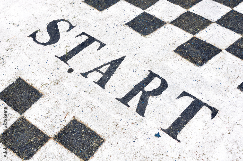 Start label on jogging lane in garden Start label on jogging lane in garden