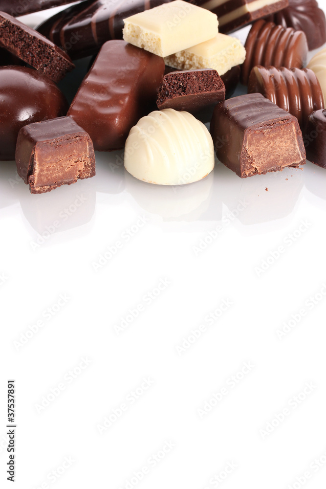 Many different chocolate candy isolated on white Many different chocolate candy isolated on white