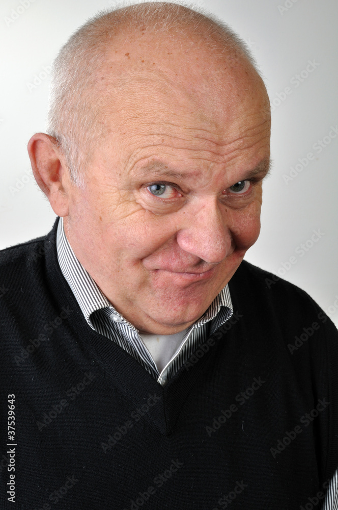 Obraz premium senior man with ironic face expression