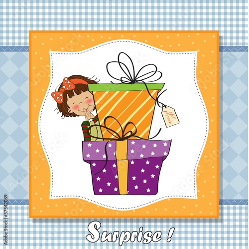 cute little girl hidden behind boxes of gifts