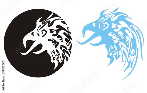 Flaming eagle head. Eagle head in a circle