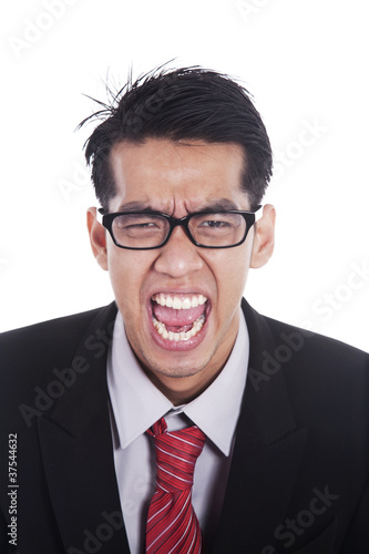 Angry businessman wearing glasses