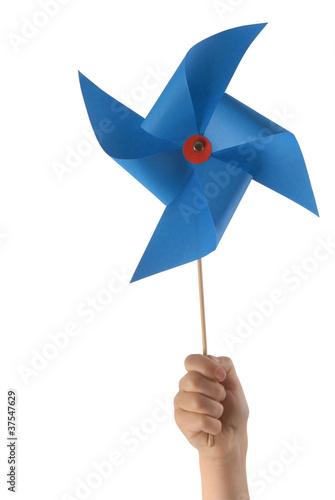 Kid hand with blue windmill