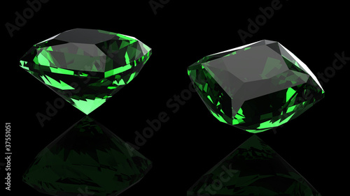 Emerald isolated on black background. Gemstone