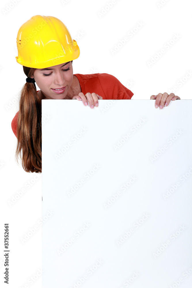Female laborer with a blank board Female laborer with a blank board