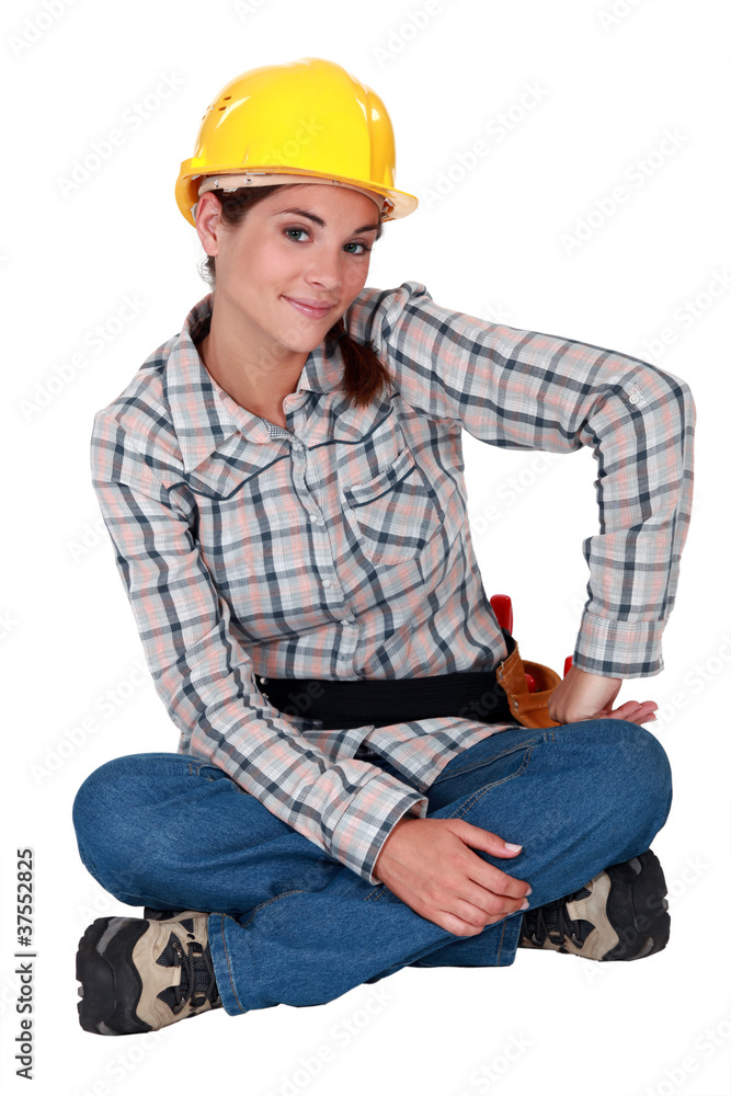 young craftswoman sitting cross-legged young craftswoman sitting cross-legged