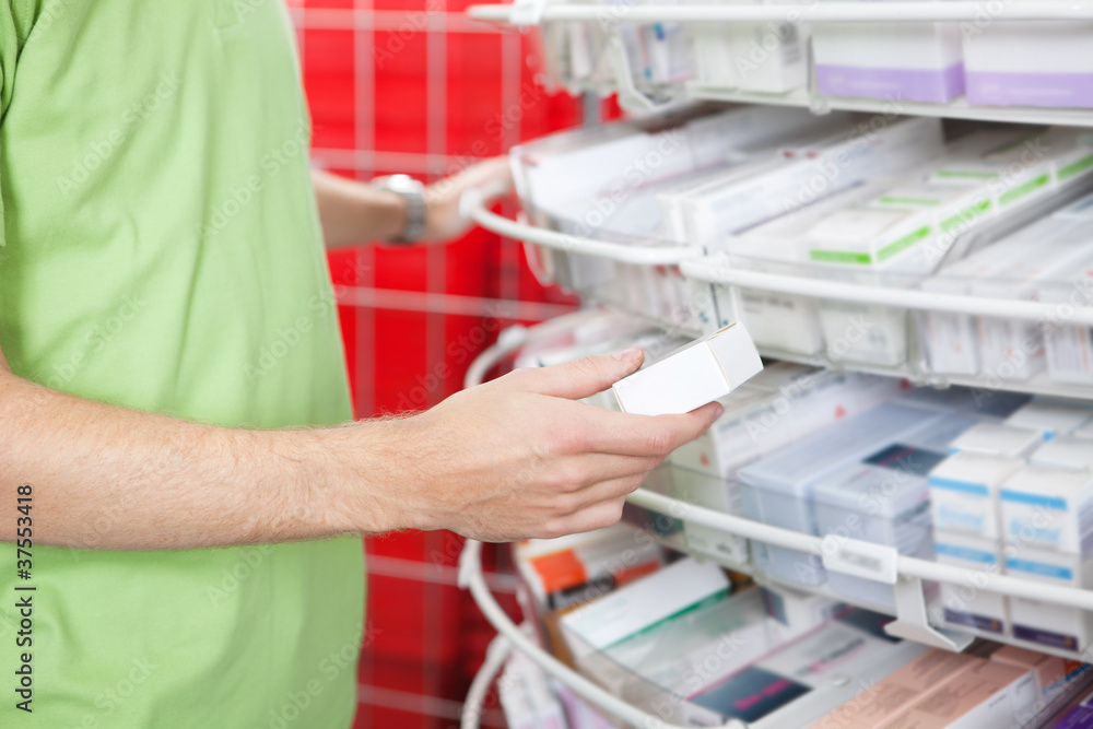 Man Holding Medication Box Man Holding Medication Box