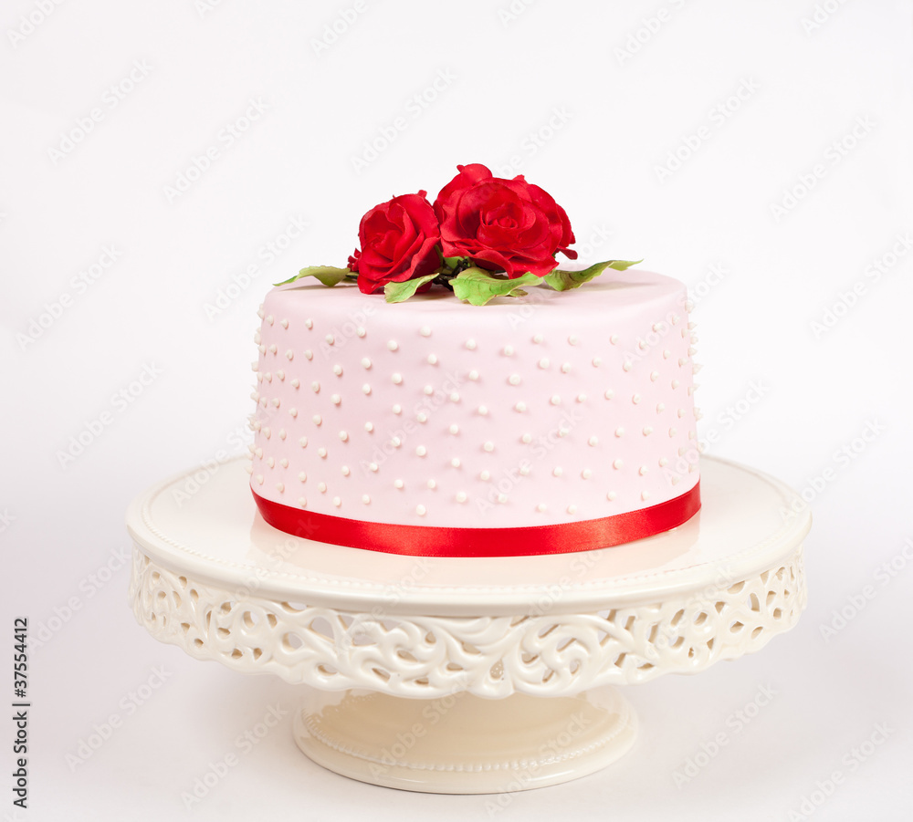 Spotted cake with red roses Spotted cake with red roses