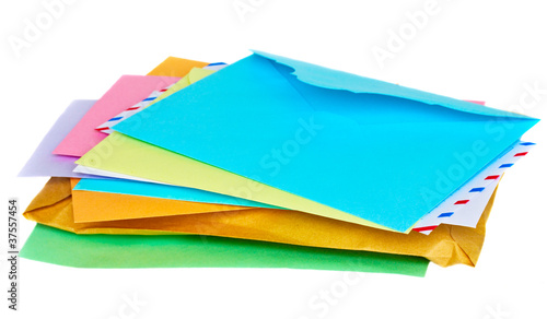 Pile of colorful envelopes isolated on white background