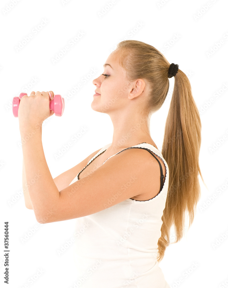 Beautiful smiling girl with free weights in gym Beautiful smiling girl with free weights in gym