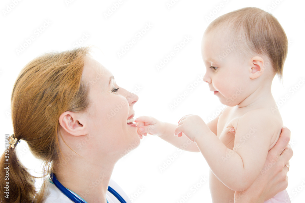 Doctor holding a baby in her arms on a white background. Doctor holding a baby in her arms on a white background.