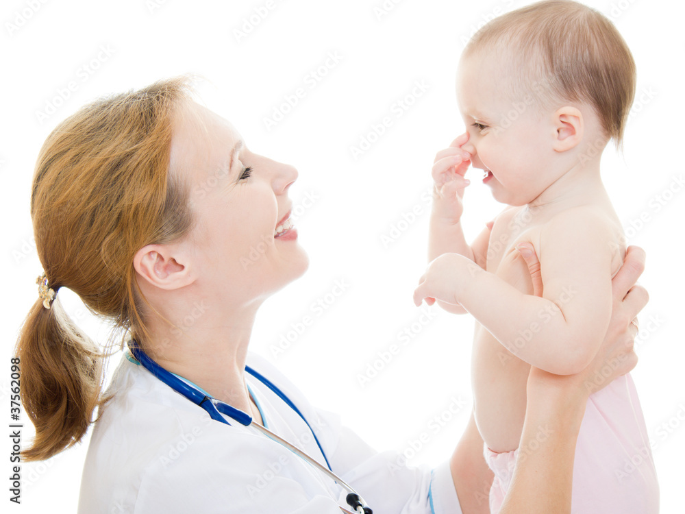 Doctor holding a baby in her arms on a white background. Doctor holding a baby in her arms on a white background.