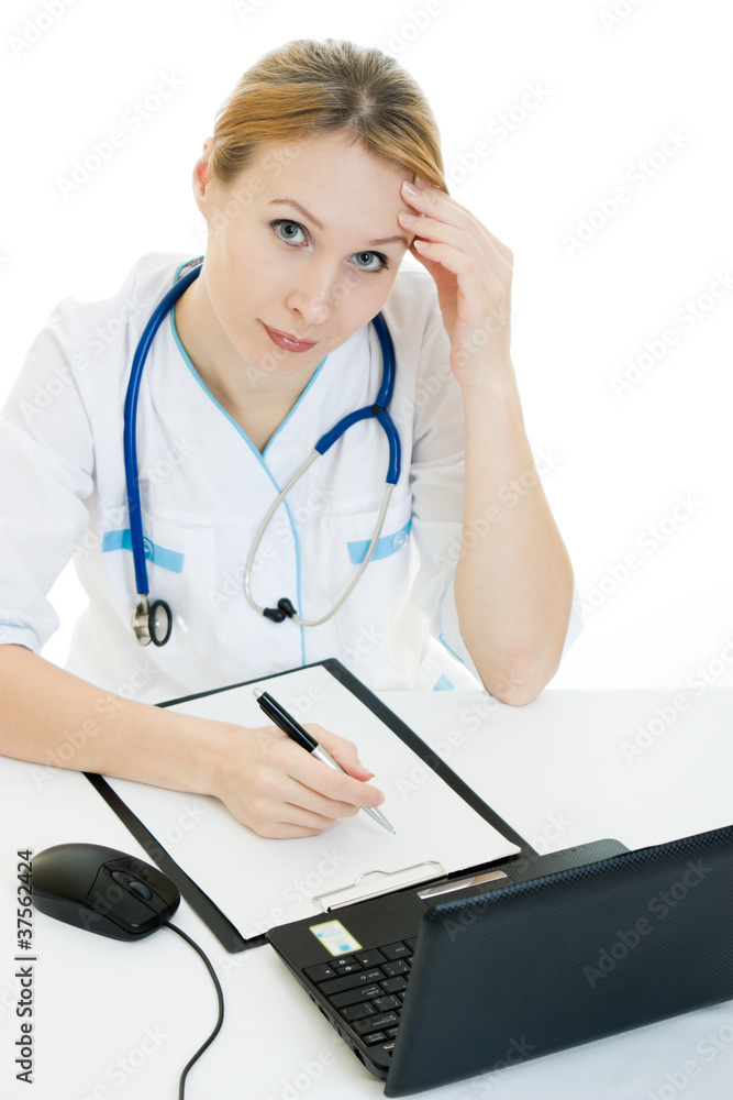 A woman doctor consultant with a laptop on a white background. A woman doctor consultant with a laptop on a white background.