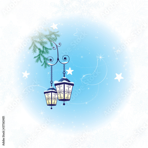 Winter background with two lanterns and spruse branch