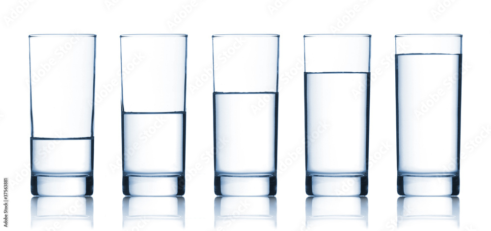 set of glasses filled with water set of glasses filled with water
