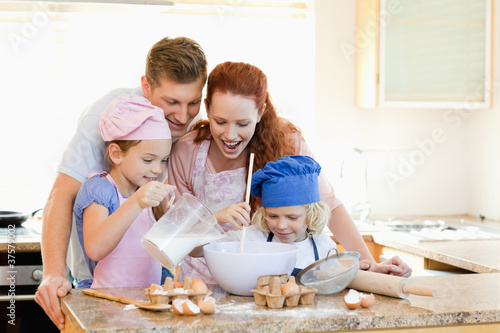 Family having a great time baking together