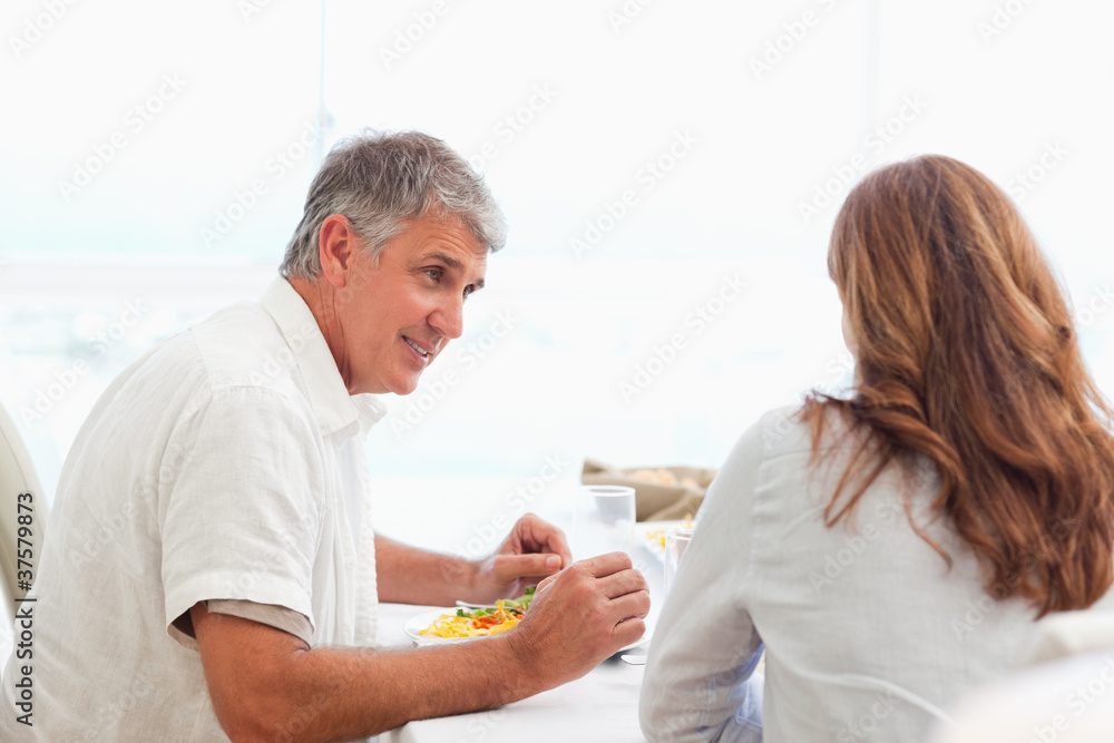 Fototapeta premium Couple talking during dinner