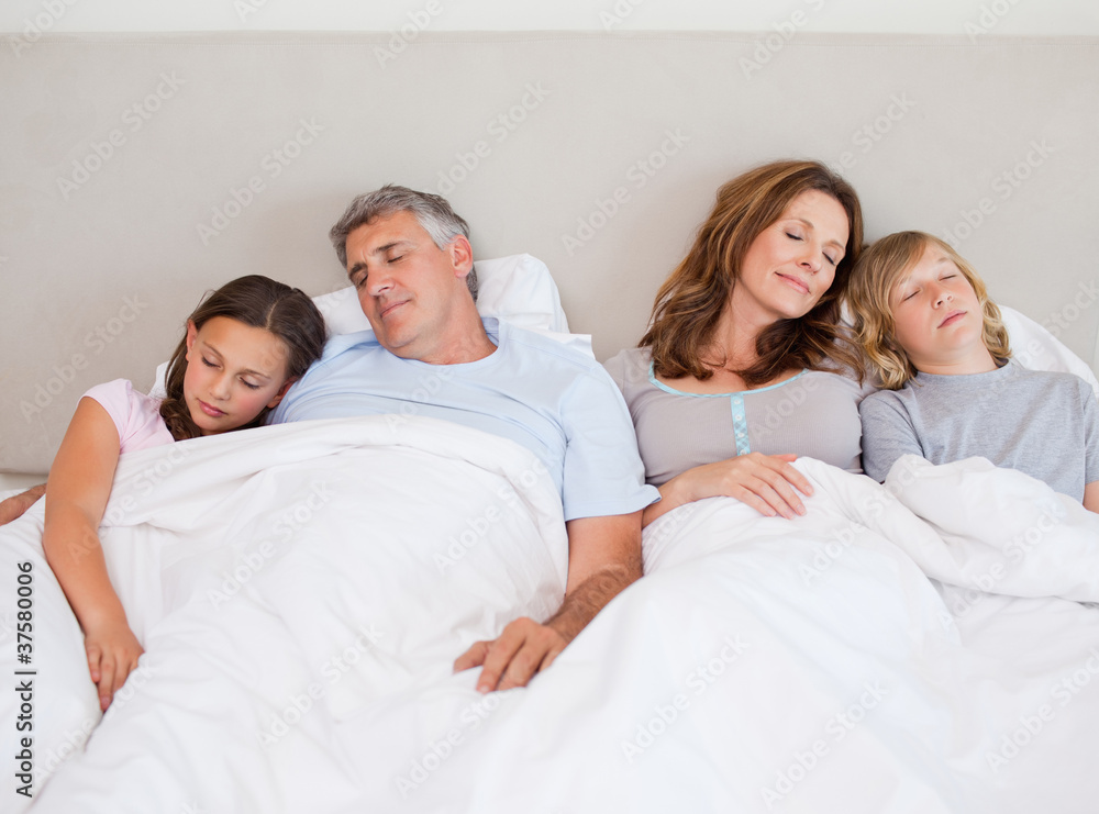 Family napping together Family napping together