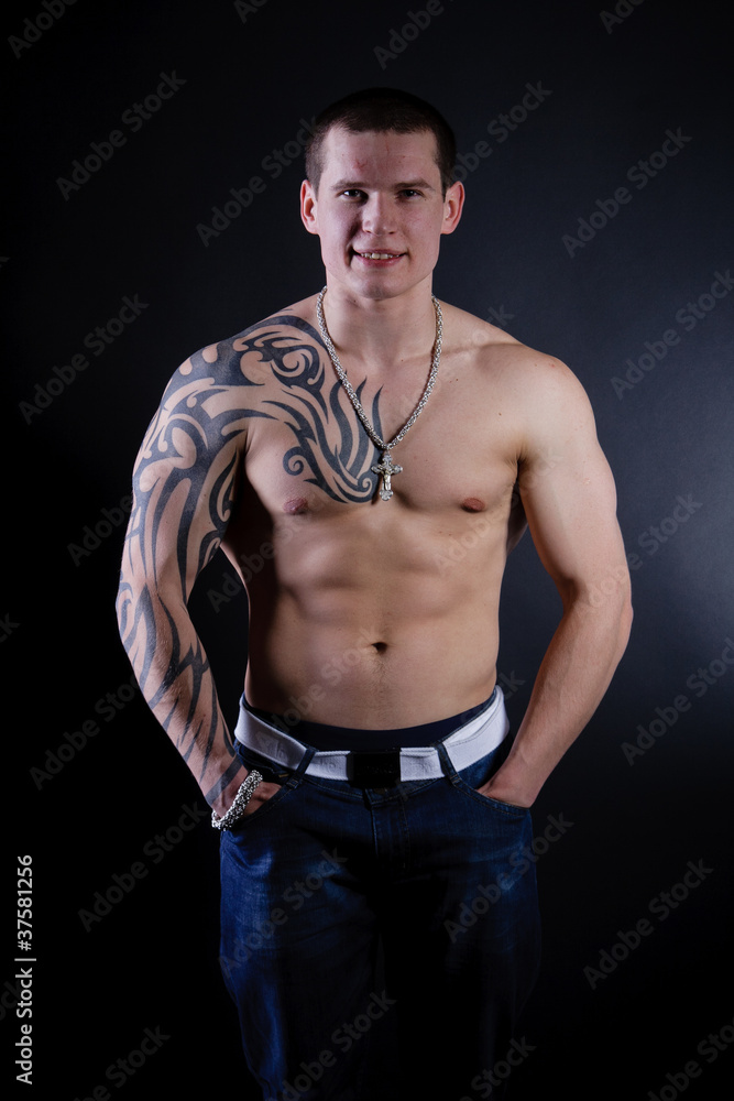 Muscular Sexy Man with tattoo Muscular Sexy Man with tattoo