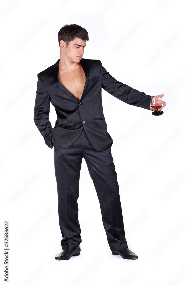 Stylish man holding glass of cognac isolated on white background Stylish man holding glass of cognac isolated on white background