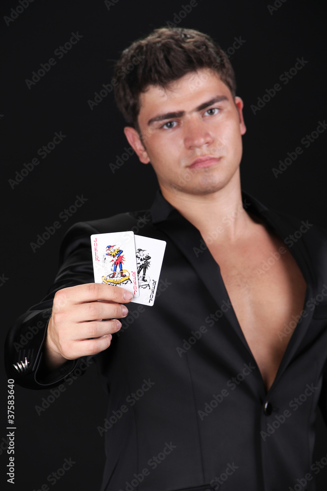 Hands and playing card in sleeve - poker game Hands and playing card in sleeve - poker game