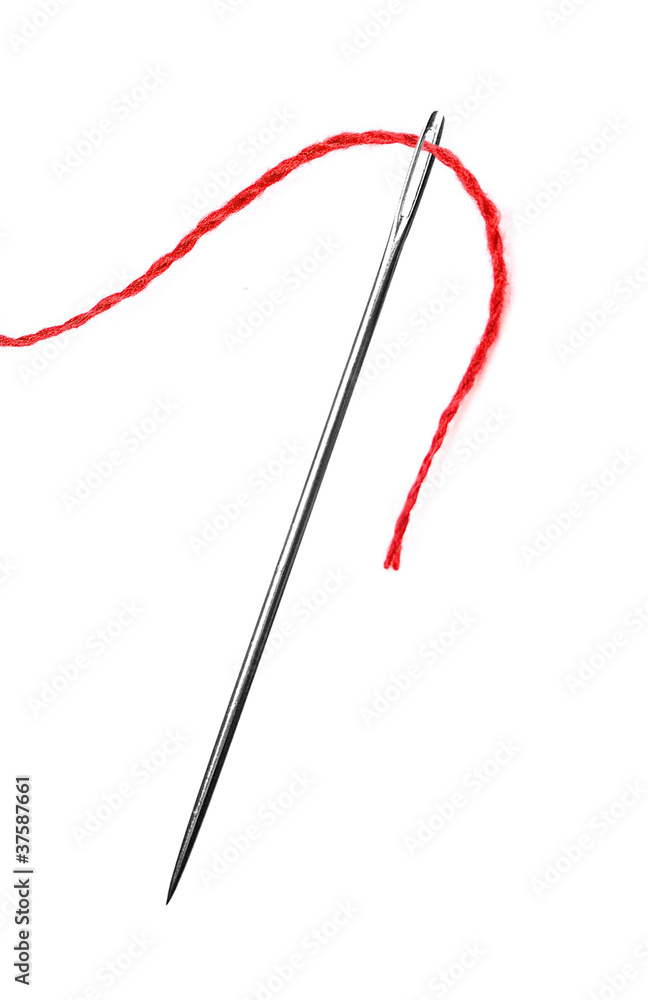 Red thread and needle isolated on white Red thread and needle isolated on white