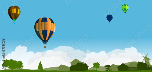 balloons above country landscape