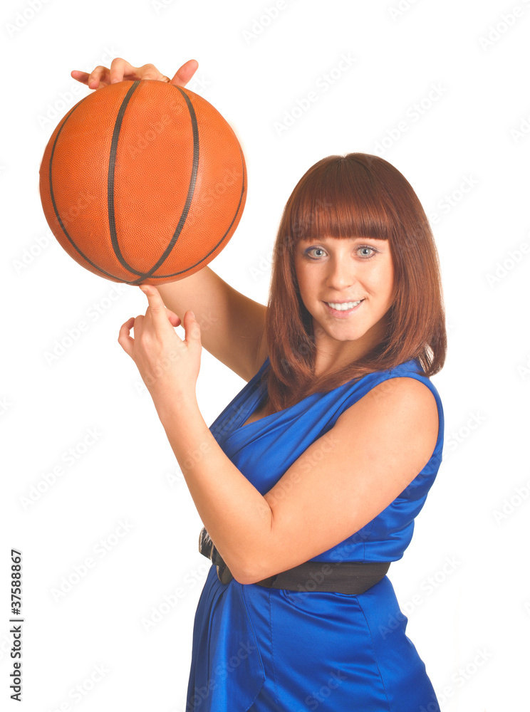 Beautiful smiling girl with orange basket ball