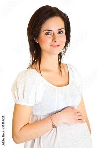 Pregnant brunette isolated on white © mathom