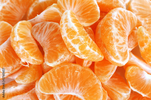 Ripe orange tangerine clove closeup