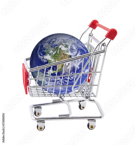 Shopping cart with globe isolated on white photo