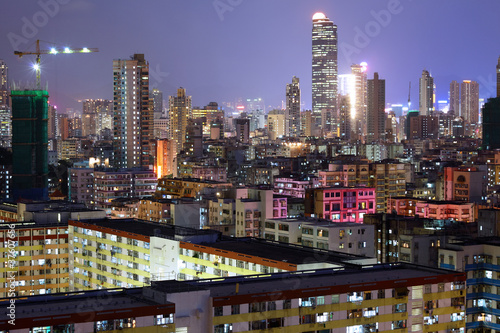 apartment buildings at night © leungchopan