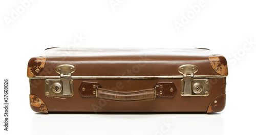 Vintage scratched suitcase isolated on white background