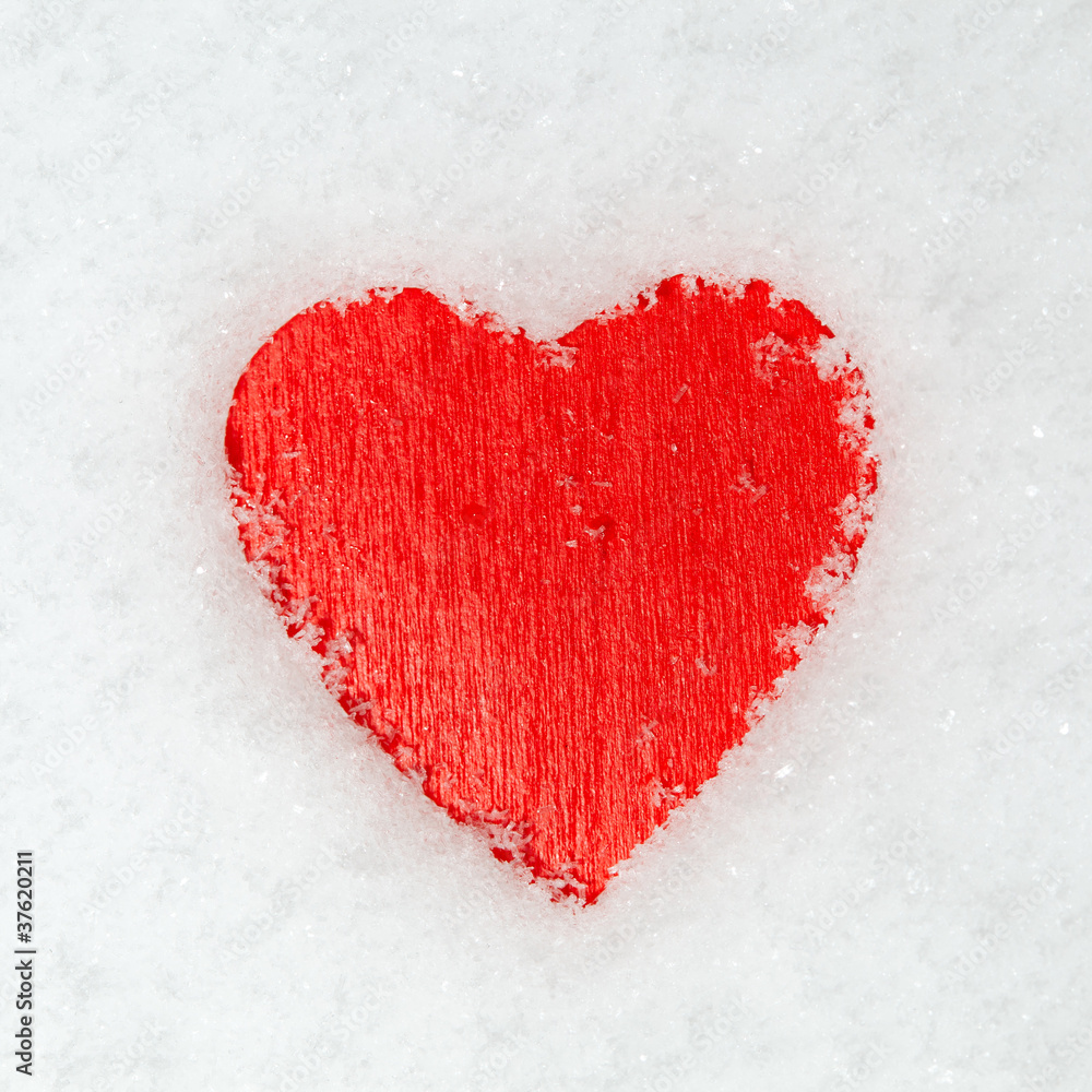 red heart on the snow red heart on the snow