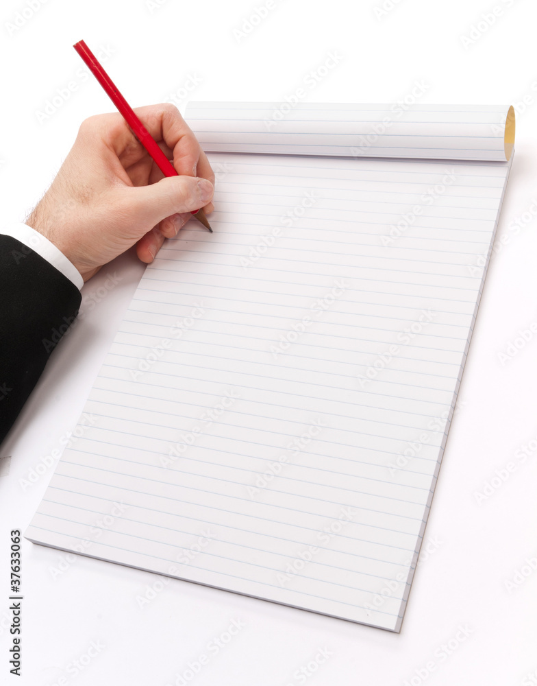 Mano che scrive sul blocco note Mano che scrive sul blocco note
