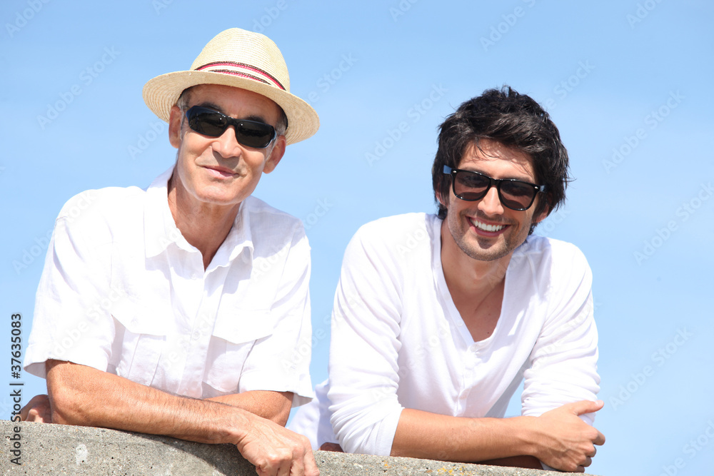 Portrait of a two men outdoors with sunglasses