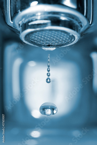 Water drop from a faucet