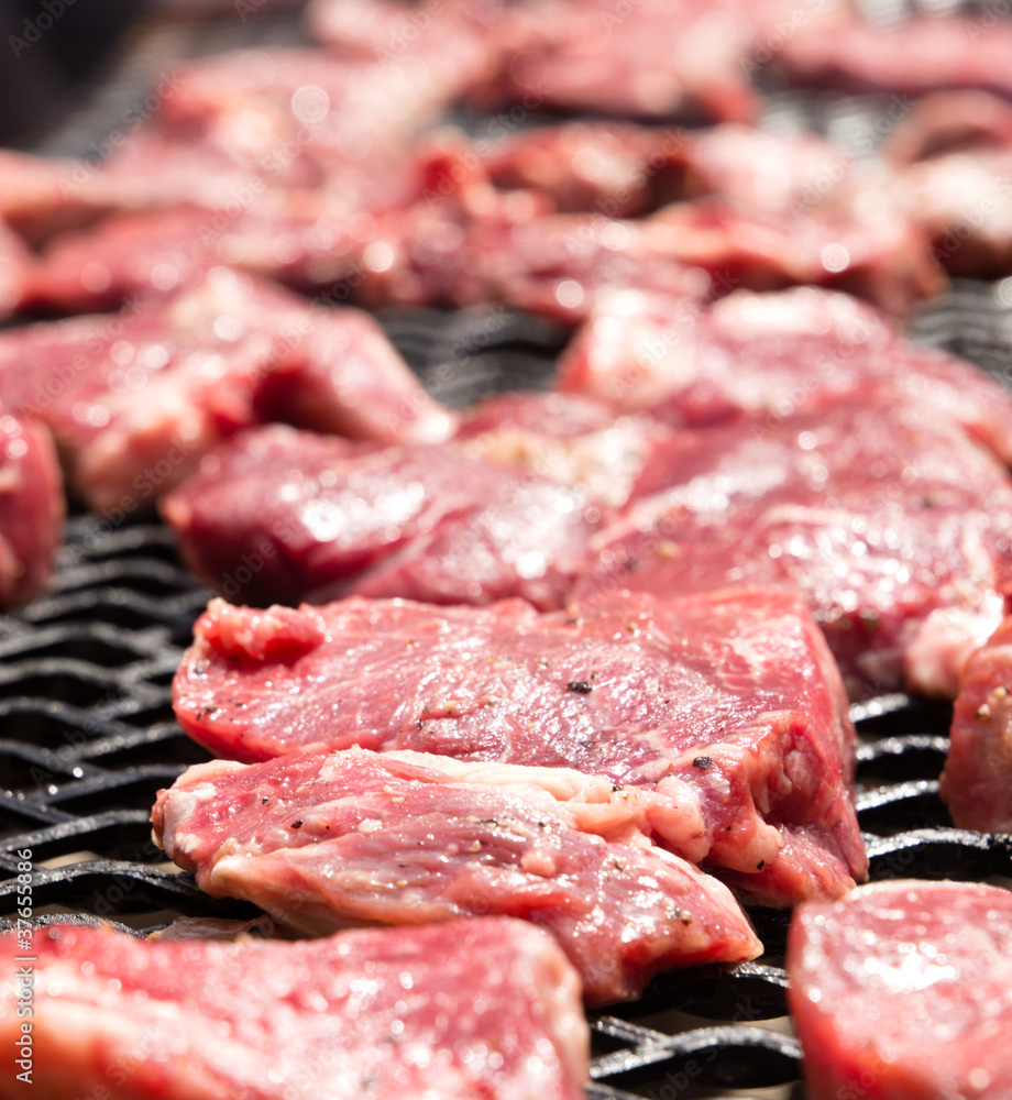 Fresh Beef Steaks on a home made barbecue Fresh Beef Steaks on a home made barbecue