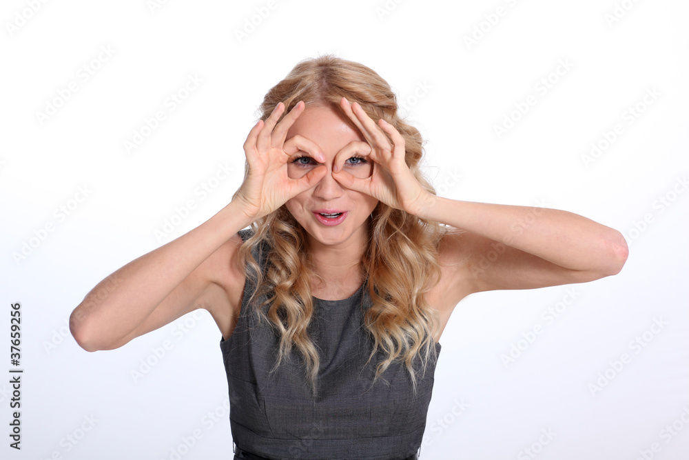 Businesswoman doing silly face Businesswoman doing silly face