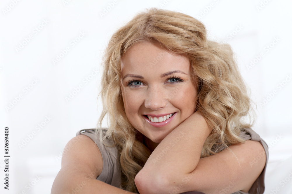 Portrait of beautiful blond woman relaxing at home Portrait of beautiful blond woman relaxing at home