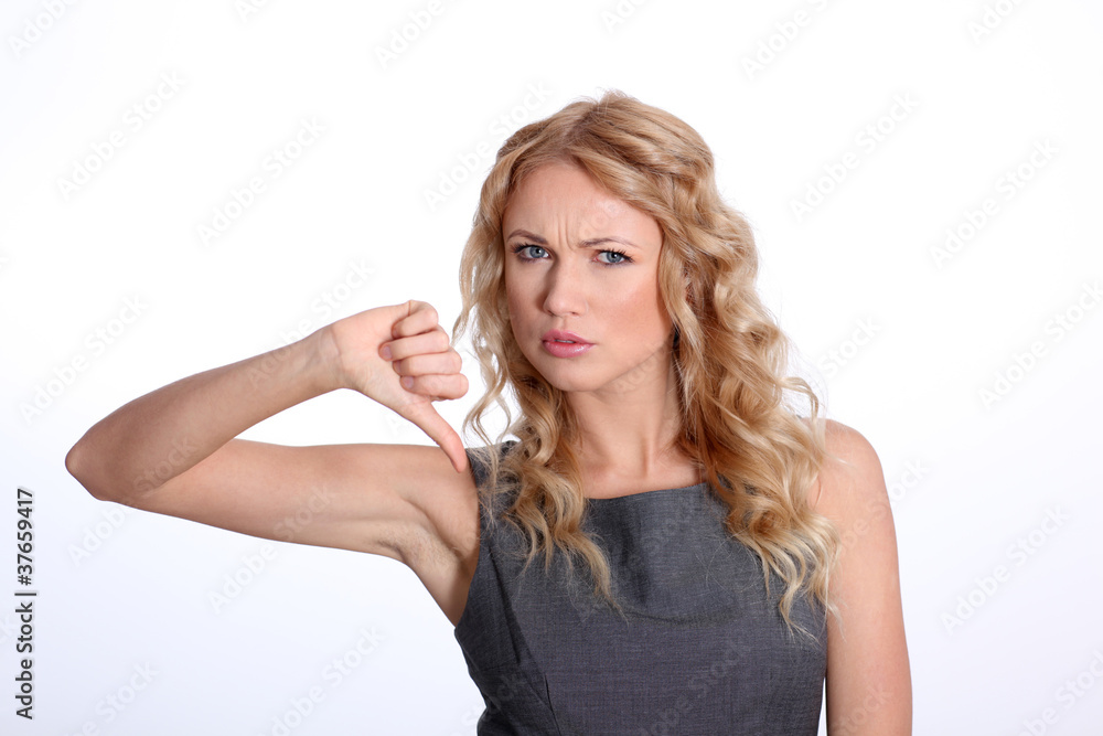 Businesswoman showing thumb down Businesswoman showing thumb down