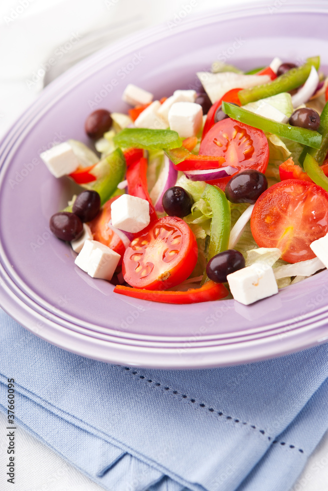 Vegetable salad with olives and feta cheese