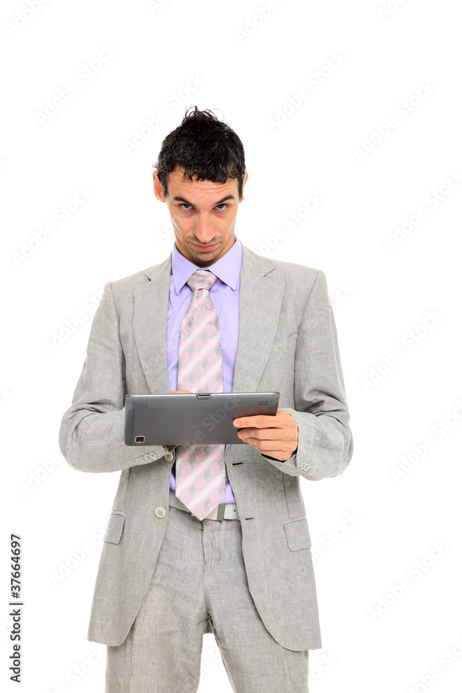 young business man standing using a tablet young business man standing using a tablet