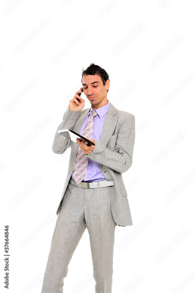 young business man standing using a tablet young business man standing using a tablet