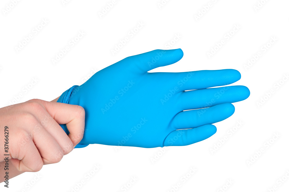 Man wears rubber glove on his hand.