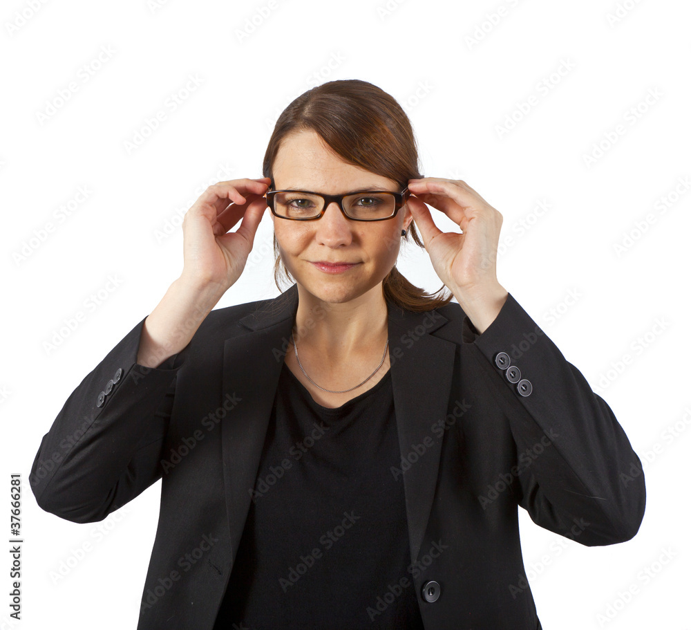 Business woman smiling and looking serious Business woman smiling and looking serious